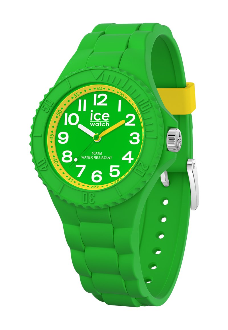 Orologio da polso in silicone verde con cassa rotonda, accenti gialli, grandi numeri bianchi e verdi e cinturino testurizzato. Resistente all'acqua fino a 10 ATM.