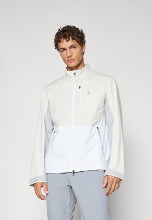 Lichtgewicht, bicolor jacket in grijs en wit, met een ritssluiting aan de voorkant, hoge kraag, en zijzakken, met een gladde textuur en minimale branding.