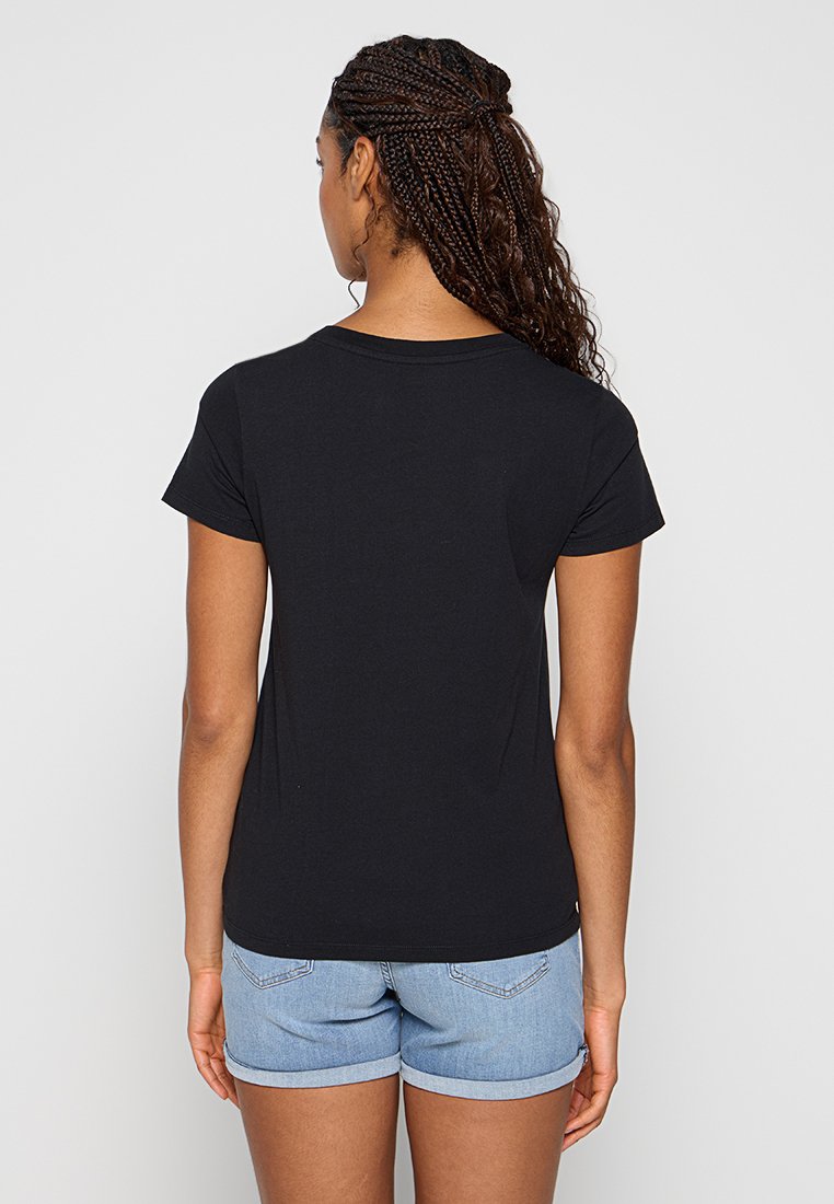 T-shirt noir à manches courtes avec un col rond, fabriqué en coton doux. La vue arrière montre une texture lisse et un style classique.