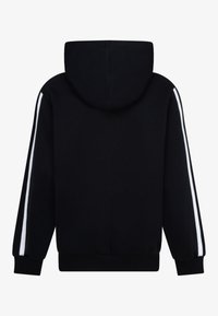 Fekete kapucnis felső nagy kapucnival, fehér csíkokkal az ujjakon. Puha anyagból készült, bordázott mandzsettákkal és derékbőrrel.