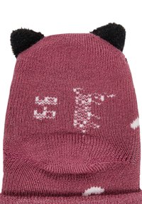 Knitted beanie in dark pink. Features black faux fur ear accents and white printed designs. Soft texture and ribbed hem.