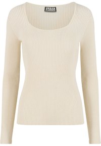 Top cu mâneci lungi, cu dungi, în culoare alb-crem, având un decolteu larg tip scoică și o siluetă strâmtă. Confecționat din material moale și elastic.