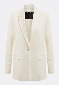 Blazer crème avec col à revers, fermeture à un bouton, deux poches avant et texture lisse. Présente un design minimaliste.