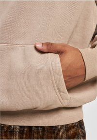 Karl Kani Jersey con capucha - sand