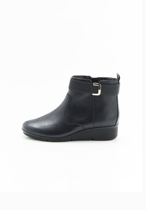 À BOUCLE AMORTYL - Botines bajos - noir