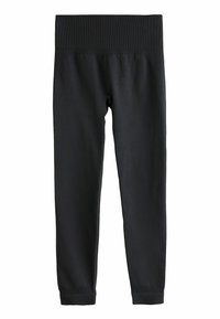 Mustad mustad leggings, mis on valmistatud siledast ja venivast kangast. Omab laia ribaga vöökohta ja kitsaid jalgu, millel on ribaga mansetid pahkluude juures.
