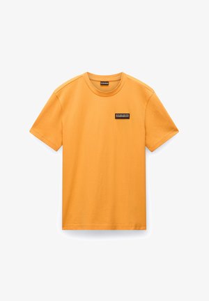 Short-sleeved t-shirt in bright orange cotton, featuring a black rectangular logo tag on the left chest, with a crew neckline.
