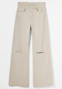 Beige wide-leg jeans with distressed rips at the knees. Made from denim, feature five pockets and a button fly.