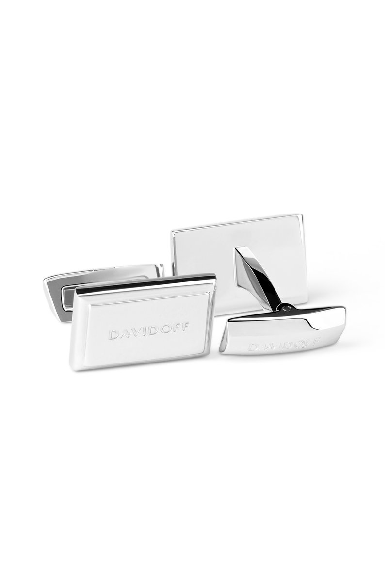 Silver cufflinks featuring a rectangular shape and a polished finish. Engraved "DAVIDOFF" logo on the surface with a smooth texture.