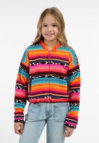 Bunte Zip-Jacke mit horizontalen Streifen in Pink, Orange, Türkis und Schwarz. Hergestellt aus gestricktem Stoff mit erdigen Mustern.