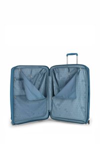 Valigia rigida blu con doppi scomparti, molteplici tasche e un interno a motivo geometrico. Dispone di manico retrattile e ruote.