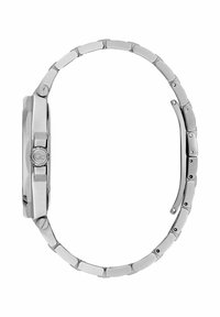 Ezüst fém karkötő óra, téglalap alakú számlappal, háromdimenziós díszítőelemekkel és láncszerű szíjjal. Simaságával, polírozott felületével és finom részleteivel tűnik ki.