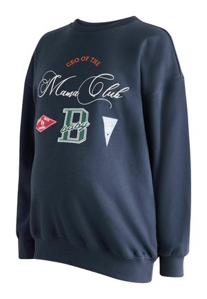 Navy blue sweatshirt with "CEO of the Mama Club" text and decorative patches, featuring a large green "B baby" emblem on the front.