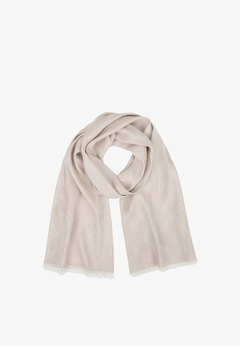 Bufanda beige clara con patrones circulares sutiles, textura suave y bordes con flecos, ligeramente anudada en el centro.