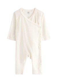 Combinaison en tricot blanc pour bébé avec des manches longues, des boutons-pression sur le côté et un motif rayé vertical discret, taille nouveau-né.