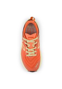Orange running shoe with a textured mesh upper, yellow laces, prominent brand logo, and a durable outsole. Designed for comfort and support.