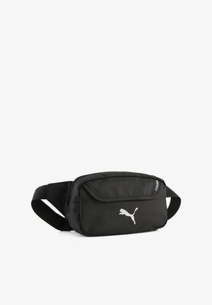 Czarna nerka wykonana z wytrzymałej tkaniny, wyposażona w przednią kieszeń zamykaną na zamek, regulowany pasek oraz odblaskowe logo.