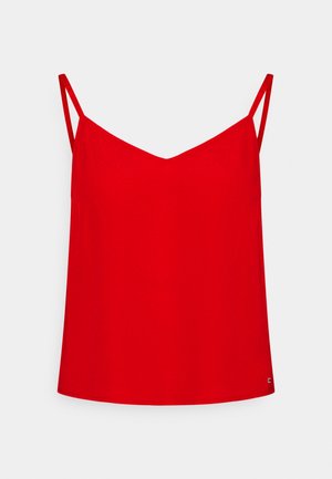 Haut rouge sans manches avec un décolleté en V, fabriqué en tissu lisse. Caractérisé par des bretelles fines et un ourlet droit. Petit logo sur le côté.