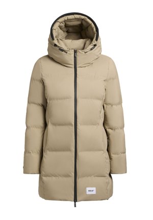 Doudoune beige avec col montant, fermeture éclair à l'avant et accents noirs. Présente des sections matelassées et une étiquette logo à l'ourlet.