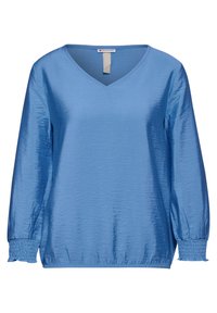 Maglietta blu a maniche lunghe con scollatura a V, realizzata in tessuto lucido. Presenta polsini elasticizzati arricciti e un design casual senza motivi.