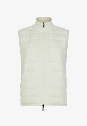 Veste matelassée sans manches de couleur blanc cassé avec col montant côtelé et fermeture éclair avant à double sens.