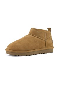 Brown suede ankle boot with thick rubber sole and pull tab at the back, designed for casual wear and comfort.