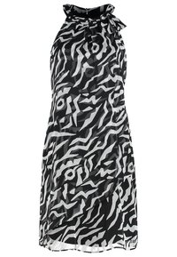 Robe sans manches noire et blanche avec un motif abstrait de type zèbre, col montant et petit nœud sur l'épaule gauche.