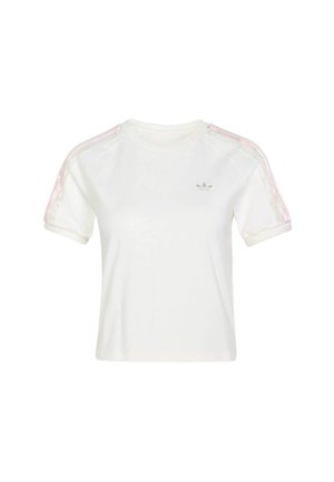 Biała bawełniana koszulka na krótki rękaw, z różowymi siateczkowymi wstawkami na ramionach i małym szarym logo na piersi. Miękka w dotyku, luźny krój.