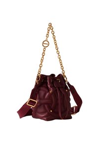 Burgundy leather bucket bag with quilted pattern, leather drawstring closure, gold chain handle, and adjustable fabric shoulder strap.