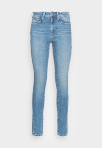 Jeans de denim azul claro com um corte skinny, cintura alta e design de cinco bolsos. Apresenta um desbotado e costura de contraste.