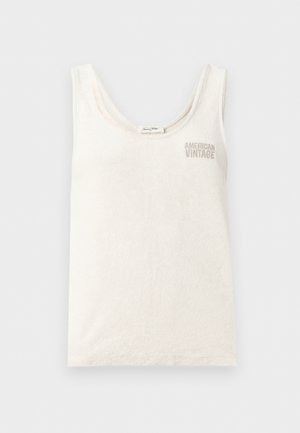 Hvit ermeløs singlet med rund hals og «American Vintage»-logo brodert på øvre venstre bryst.