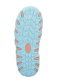 Light blue rubber shoe sole with textured tread patterns and orange accents, featuring grips and drainage features for traction.