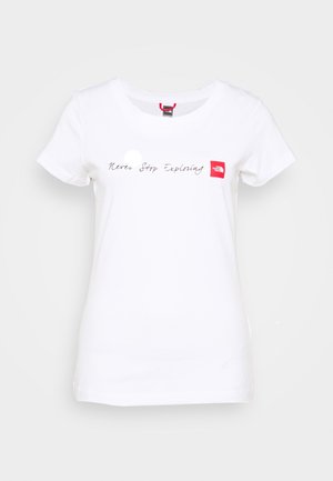 White cotton T-shirt with a round neckline. Features "Never Stop Exploring" text in black script and a small red logo patch. Short sleeves.