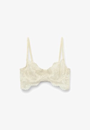 Spitzen-Bralette in Off-White mit gewellten Kanten und verstellbaren Trägern, das mit floralem Muster und weicher Textur begeistert.