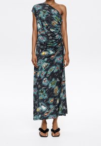 One-shoulder maxi dress made of smooth fabric featuring a dark ocean print with colorful marine life, draping design, and side gathering detail.