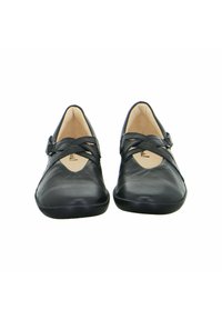 Schwarze Lederschuhe mit abgerundetem Zehenbereich und überkreuztem Riemen. Glatte Oberfläche mit Gummisohle, die für Komfort und Stabilität sorgt.