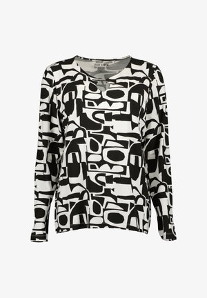 Langærmet top i sort og hvid med et abstrakt mønster, rund hals med en nøglehul detalje og en afslappet pasform. Fremstillet af blødt stof.