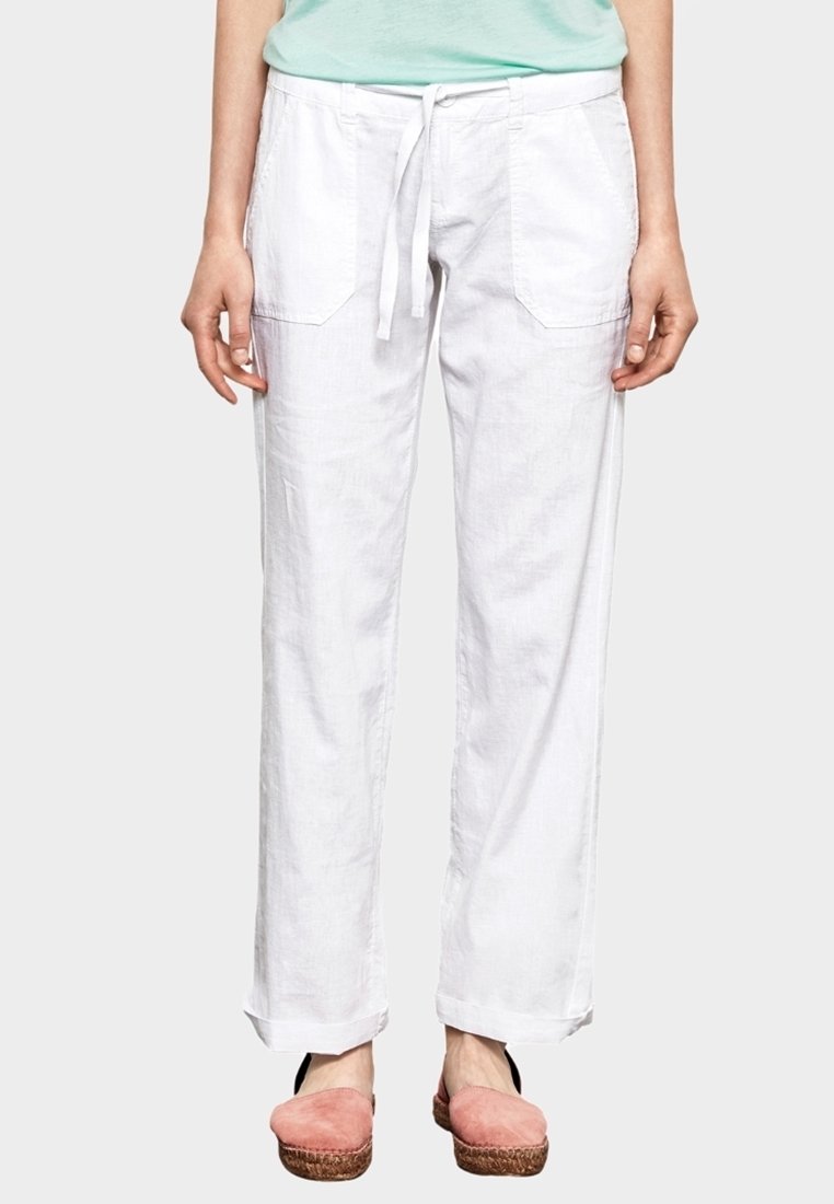 Pantalons larges en lin blanc avec une taille élastique et un cordon de serrage. Comprend deux poches avant et une coupe décontractée au niveau des chevilles.
