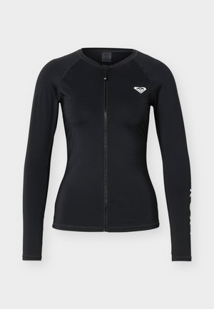 Čierny dlhý rukáv s na zips uzatvárateľným rashgardom s okrúhlym výstrihom a malým bielym logom na ľavej strane hrudníka a rukáve.