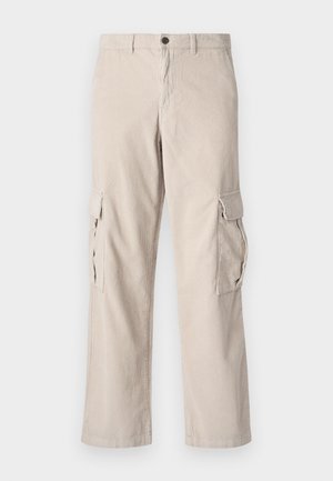 Beige corduroy cargo pants with two side pockets, a button closure, and a wide-leg cut; features vertical ribbing texture.
