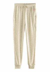 Beige joggers van zachte stof, met zijzakken, een elastische tailleband en subtiele branding langs de zijnaad.