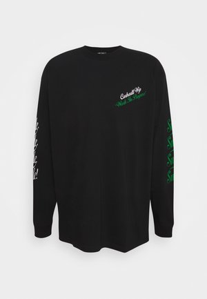 Schwarzes Langarm-T-Shirt aus Baumwolle mit weißen und grünen Textgrafiken. Der Text umfasst "Carhartt WIP" und stilisierte Schriftzüge entlang der Ärmel.