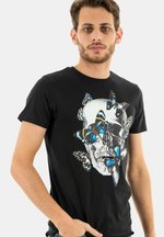 Le Temps des Cerises T-Shirt in Lotus