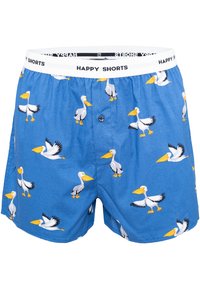 Boxer shorts blu con stampa di pellicani in diverse pose, dotati di una vita elastica bianca con la scritta "HAPPY SHORTS" in nero.