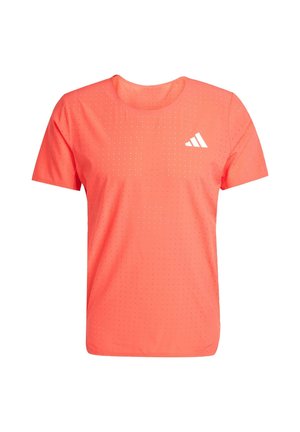 Short-sleeve athletic shirt in vibrant coral, made from lightweight fabric with perforations. Features a white logo on the chest.