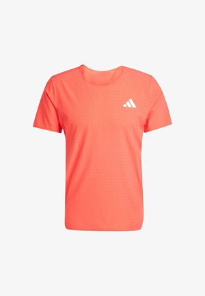 Short-sleeve athletic shirt in vibrant coral, made from lightweight fabric with perforations. Features a white logo on the chest.