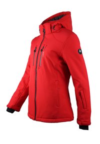 Veste rouge à capuche, fabriquée en tissu doux. Comprend des poches poitrine zippées, des poignets élastiques et une poche latérale zippée. Texture lisse.