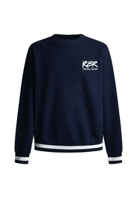 Granatowy sweter z dzianiny z białymi akcentami na mankietach i dolnej krawędzi, z logo "RBR Red Bull Racing" na piersi.