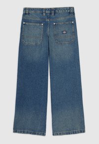 Wide-leg blue denim jeans shown from the back with two patch pockets, belt loops, and a small branded label on the right pocket.
