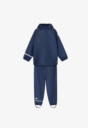 Conjunto de lluvia en color navy que incluye una chaqueta con capucha y cremallera y pantalones con cintura elástica, ambos con acentos reflectantes en blanco y puños elásticos.